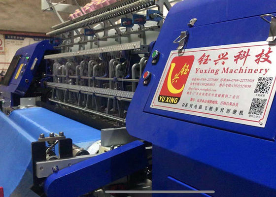 Industrial Quilt Machine produceert blankets wit en blauw max 240m/h